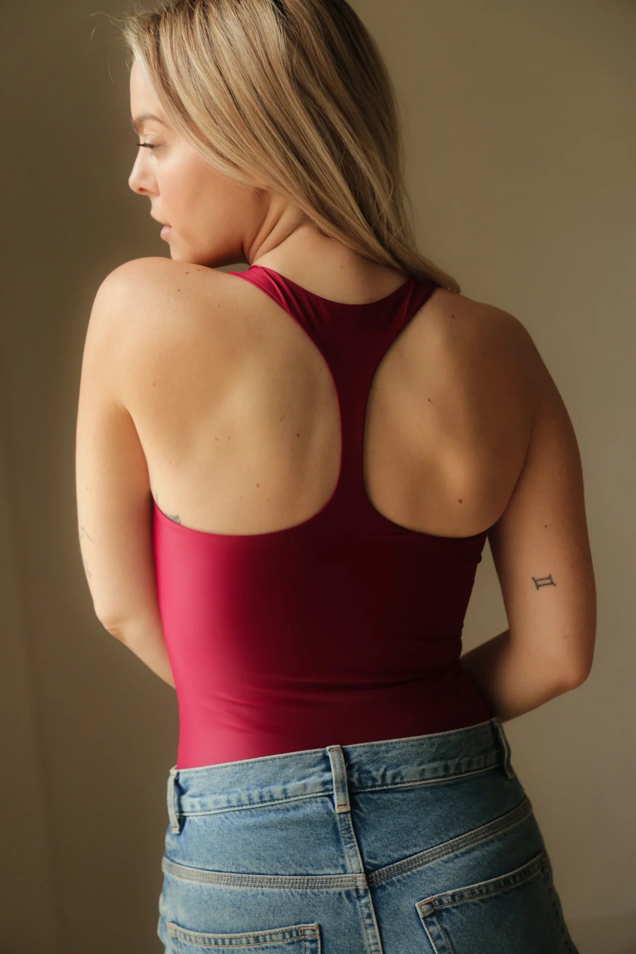 Magnolia Bodysuit Wine. Body deportivo sostenible mujer